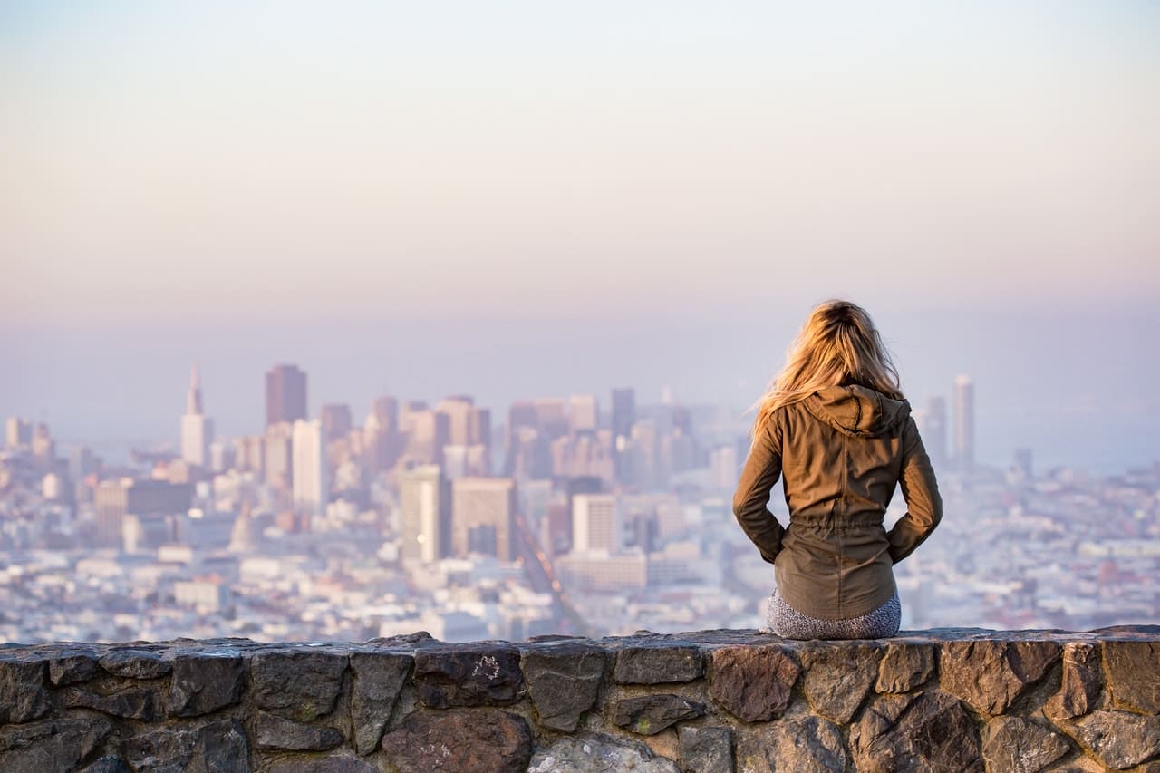 woman looking at best Queens neighborhoods for young couples