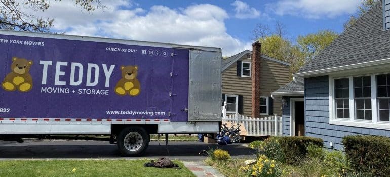 moving truck in the driveway