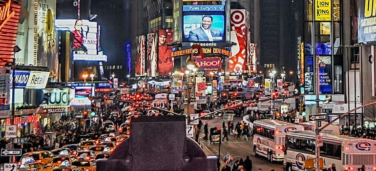 people in Times Square as one of the ways to celebrate New Year's Eve in Manhattan