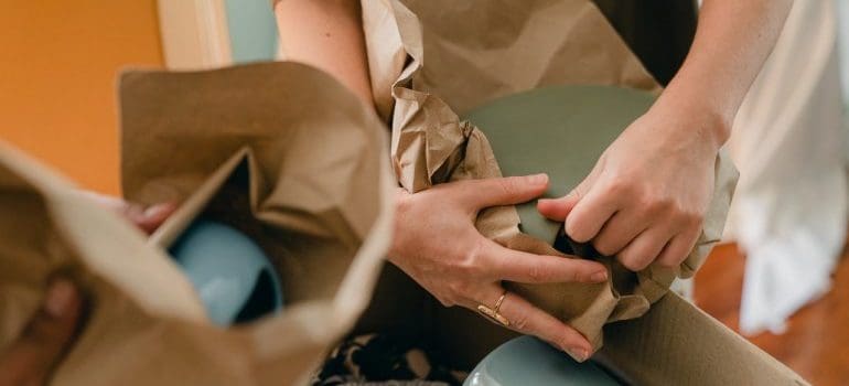 Hands packing items