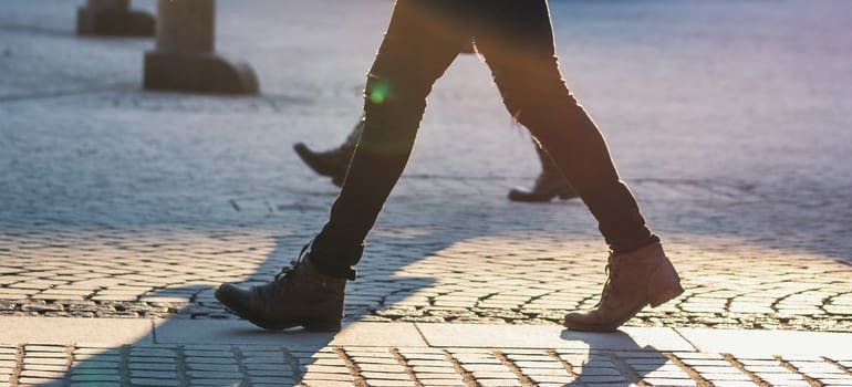 person walking as one of the ways of spending February in Manhattan