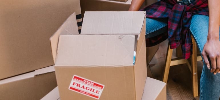 cardboard box you will use to move a home library 