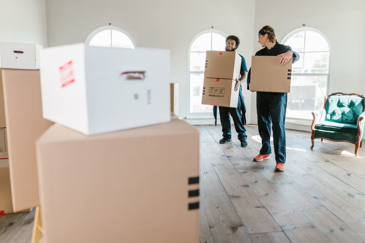 two movers with moving boxes