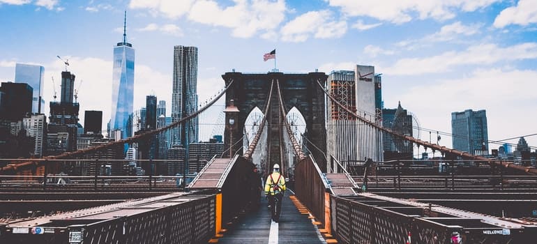 A man walking on a bridge