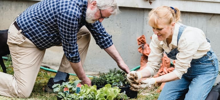 senior couple having fun in garden