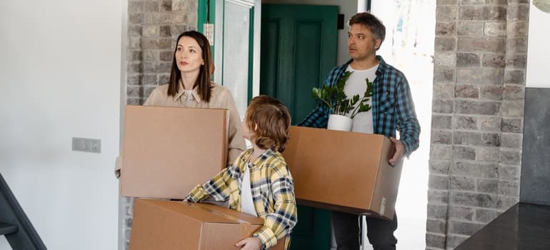 A family arriving into a new house