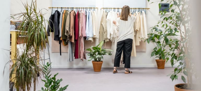 a person shopping as one of the reasons to Move to Hoboken from Englewood