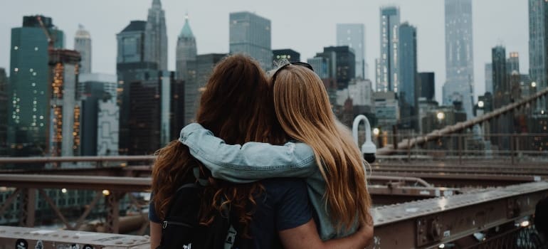 two friends hugging 